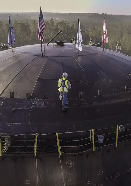 Worker on tank